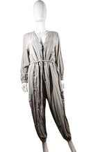 Load image into Gallery viewer, Introducing the Asos tan zip up jumpsuit with a tie belt - because life&#39;s too short for boring outfits! With measurements like Flat Chest - 31&quot;, Waist - 39&quot;, Sleeve - 22 1/2&quot;, Inseam - 22 1/2&quot;, and Length - 55&quot;, this jumpsuit will have you looking stylish and feeling comfortable. So why settle for anything less? Zip up and zip out in this must-have piece.