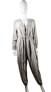 Introducing the Asos tan zip up jumpsuit with a tie belt - because life's too short for boring outfits! With measurements like Flat Chest - 31", Waist - 39", Sleeve - 22 1/2", Inseam - 22 1/2", and Length - 55", this jumpsuit will have you looking stylish and feeling comfortable. So why settle for anything less? Zip up and zip out in this must-have piece.