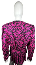 Load image into Gallery viewer, Vintage Oleg Cassini 100% silk bright pink and black peplum top that buttons in the front and has an accordion style back. This is fun well made vibrant top. Measured Flat Chest - 36&quot; Sleeve - 24&quot; Waist - 31&quot;