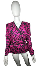 Load image into Gallery viewer, Vintage Oleg Cassini 100% silk bright pink and black peplum top that buttons in the front and has an accordion style back. This is fun well made vibrant top. Measured Flat Chest - 36&quot; Sleeve - 24&quot; Waist - 31&quot;