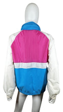 Load image into Gallery viewer, This vintage windbreaker jacket from Cabin Creek Petite is a playful pop of color with a phantom hood for rainy days. With a chest measurement of 45 inches, sleeve length of 28 inches, and a length of 26.5 inches, it&#39;s perfect for adding some fun to yo...