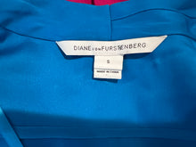 Load image into Gallery viewer, Experience luxury in this excellent condition blue silk blouse from Designer Diane Von Furstenberg. With its kimono-style drape and waist elastic stretch band, it&#39;s perfect for sizes small-medium.