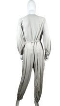 Load image into Gallery viewer, Introducing the Asos tan zip up jumpsuit with a tie belt - because life&#39;s too short for boring outfits! With measurements like Flat Chest - 31&quot;, Waist - 39&quot;, Sleeve - 22 1/2&quot;, Inseam - 22 1/2&quot;, and Length - 55&quot;, this jumpsuit will have you looking stylish and feeling comfortable. So why settle for anything less? Zip up and zip out in this must-have piece.