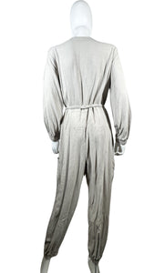 Introducing the Asos tan zip up jumpsuit with a tie belt - because life's too short for boring outfits! With measurements like Flat Chest - 31", Waist - 39", Sleeve - 22 1/2", Inseam - 22 1/2", and Length - 55", this jumpsuit will have you looking stylish and feeling comfortable. So why settle for anything less? Zip up and zip out in this must-have piece.