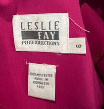 Load image into Gallery viewer, A statement blazer from Vintage Leslie Fay Petite Collections - in bold pink - rocks a sassy tie, plus a quartet of front buttons. Measurements: Chest - 34&quot; (flat), Sleeve - 23&quot;, Length - 23&quot;.