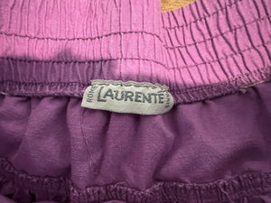 Experience the elegance and quality of our Vintage Laurente' Skirt in gorgeous purple. Featuring a stylish pull-on design and convenient pockets, this skirt is also made with a stretch fabric for maximum comfort. With a flat waist of 30 inches, roomy h...
