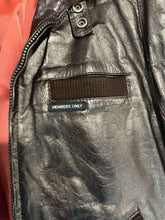 Load image into Gallery viewer, In perfect condition, this Vintage Brown Leather Members Only jacket is a rare find! The zip-up bomber jacket features a unique shoulder collar strap and has chest, sleeve, and length measurements of 40&quot;, 26&quot;, and 28&quot; when laid flat. Don&#39;t miss out on...