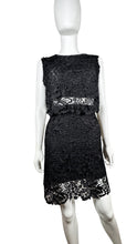 Load image into Gallery viewer, Get ready to turn heads in this Black Lace 2PC Skirt and Top! Made with 100% Polyester and featuring measurements for Chest (35&quot;), Waist (30&quot;), Hips (36&quot;), Top Length (16&quot;), and Bottom Length (20&quot;), you&#39;ll feel confident and fabulous in this stunning set.
