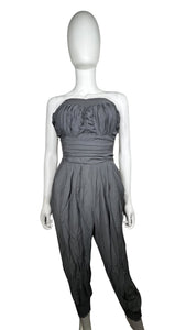 A medium grey jumpsuit without sleeves, featuring an elastic waist and ankles. Made by RND Los Angeles. Dimensions: 28" chest, 20" waist, 40" hips, 25" inseam, and length of 47".