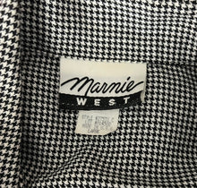 Load image into Gallery viewer, Experience the timeless style and sophistication of the Vintage Marnie Houndstooth 80s Blazer. This stunning black and white blazer features two front pockets, a single front button, and stylish black cuffs on the sleeves. With a measured flat chest of...