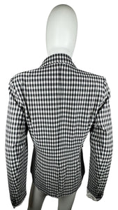 Introducing the Maison d' Amelie blazer: a playful addition to your wardrobe. This black and white plaid patterned blazer measures flat at 30" for the chest, with sleeves 24" long and a total length of 29".