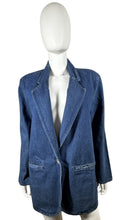Load image into Gallery viewer, This denim blazer from the 80&#39;s Hunt Club is the epitome of classic vintage style. Measured Flat: Chest - 36&quot;, Sleeve - 23 1/2&quot;, Length - 34&quot;