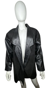 A rare stylish small black Vintage Preston & York real leather and suede jacket from the 80's with a snakeskin pattern on the suede parts. Measured FlatChest - 40"Sleeve - 22"Length - 34"