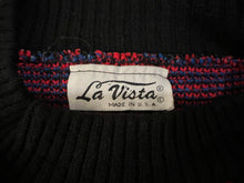 Load image into Gallery viewer, Experience vibrant warmth and charm with the one-of-a-kind Vintage La Vista Knitted Sweater, available in sizes small to medium. Measured flat, the chest is 36 inches, the sleeves are 16 inches, and the length is 24 inches. Fall in love with the playfu...