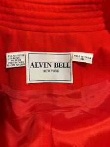 Experience the unique charm of the Vintage Alvin Bell Red Blazer, complete with stunning gold metal button accents on the sleeves and front. Enhance your style with this one-of-a-kind piece that measures 33" in the chest and 22" in the sleeves, with a...