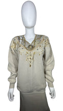 Load image into Gallery viewer, Get that 80&#39;s vibe with this matching set! A fab cream sweater and a stretchy skirts set, embellished with gold accents, rope design and gold studs along the skirt slit. Measurements for Top - 40&quot; chest, 22&quot; sleeves, 29&quot; length. Skirt - 34&quot; waist, 33&quot;...