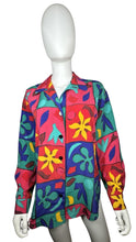 Load image into Gallery viewer, Check out this totally rad Vintage Chaus Blouse with long sleeves and small slits at the bottom! Unfortunately, it&#39;s missing one of its buttons (the second to last one, to be precise). Measured Flat: Chest - 39&quot;, Sleeve - 22&quot;.