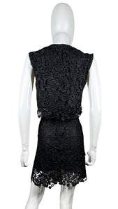 Get ready to turn heads in this Black Lace 2PC Skirt and Top! Made with 100% Polyester and featuring measurements for Chest (35"), Waist (30"), Hips (36"), Top Length (16"), and Bottom Length (20"), you'll feel confident and fabulous in this stunning set.