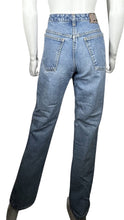 Load image into Gallery viewer, Experience a one-of-a-kind find with these Rare Vintage Marithe&#39; Francois Girbaud Jeans! With a high-waisted silhouette and measurements of 28&quot; waist, 32&quot; hips, 29&quot; inseam, and 41&quot; length, these jeans are a must-have for your stylish wardrobe. Don&#39;t mi...
