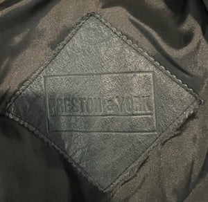 A rare stylish small black Vintage Preston & York real leather and suede jacket from the 80's with a snakeskin pattern on the suede parts. Measured FlatChest - 40"Sleeve - 22"Length - 34"