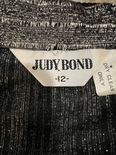 Load image into Gallery viewer, Experience the ultimate 70&#39;s vibe with this shiny sparkly Lame&#39; lurex fabric silver button party top from Judy Bond. Don&#39;t let the pictures deceive you, it&#39;s even better in person. Measured Flat Chest - 38&quot; Sleeve - 25&quot; Waist - Length - 29&quot;.