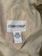 Load image into Gallery viewer, Experience the unbeatable style and functionality of the Vintage Cabin Creek windbreaker in the on-trend color of tan. With measurements of 42&quot; for the chest, 26&quot; for the sleeves, and a length of 31&quot;, this oversized jacket is the perfect addition to an...