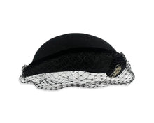 Load image into Gallery viewer, This pillbox hat is a vintage gem, featuring a black velvet design and adorned with a silver and rhinestone brooch. It&#39;s Union made and comes in its original box.