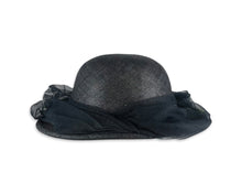 Load image into Gallery viewer, Appearing straight out of the 50&#39;s, this navy Breton hat boasts a blooming bouquet of blue wildflowers upon the front brim. Part of the New York Creation clan, it features a 6 1/2 inch diameter crown.