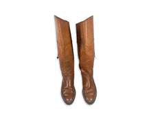 Load image into Gallery viewer, Experience the timeless beauty and quality of our Vintage Bandits Leather Boots. Handcrafted in Brazil, these stunning high boots are made with rich brown leather and designed to fit a women&#39;s size 8. Embody style and sophistication with every step you...
