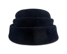 Load image into Gallery viewer, This fab 50&#39;s Pillbox Black Hat boasts a luxurious velvet and wool construction, topped off with a dazzling gold and rhinestone brooch. Measuring 8&quot; in diameter, it&#39;s a stylish nod to the vintage era.