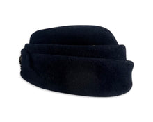 Load image into Gallery viewer, This fab 50&#39;s Pillbox Black Hat boasts a luxurious velvet and wool construction, topped off with a dazzling gold and rhinestone brooch. Measuring 8&quot; in diameter, it&#39;s a stylish nod to the vintage era.
