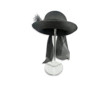 Load image into Gallery viewer, This charming hat features a playful vintage Breton Bumper design, complete with a feather and scarf-like wrap that adds a touch of flair to the back. Although I&#39;m not certain of its age, it measures a perfect 7&quot; in diameter.
