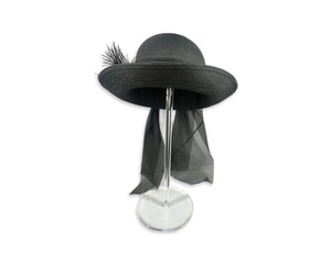 This charming hat features a playful vintage Breton Bumper design, complete with a feather and scarf-like wrap that adds a touch of flair to the back. Although I'm not certain of its age, it measures a perfect 7" in diameter.