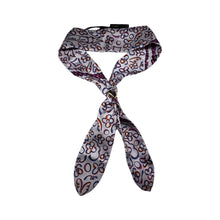 Load image into Gallery viewer, Add a touch of luxury to any outfit with this authentic Louis Vuitton floral silk scarf. The beautiful design and signature gold tie ring make it a versatile accessory for any occasion. Upgrade your style with a touch of French elegance!