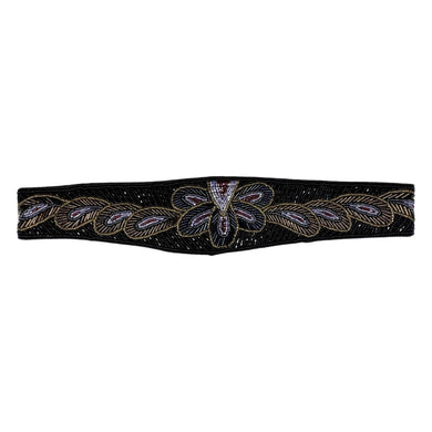 This waist belt is the perfect combo of vintage chic and playful fun! Featuring a black, hand-beaded design with a gleaming iridescent and gold floral pattern, it measures a cool 31 1/2 inches and attaches with a convenient Velcro assembly.