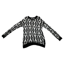 Load image into Gallery viewer, Experience the versatility of our black and white patterned geometric sweater - wear it as a dress with tights underneath or pair it with your favorite bottoms for a stylish look! Measured Flat Chest -36&quot; Sleeve -22&quot; Length -30&quot;