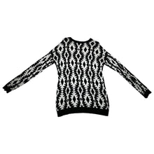 Load image into Gallery viewer, Experience the versatility of our black and white patterned geometric sweater - wear it as a dress with tights underneath or pair it with your favorite bottoms for a stylish look! Measured Flat Chest -36&quot; Sleeve -22&quot; Length -30&quot;