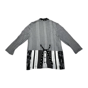 A large black and white vintage Surya cardigan jacket. Measured FlatChest - 39"Sleeve - 23"Length - 34"