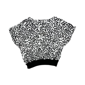 A vintage black and white all over floral print shirt by Rhoda Lee. Measured Flat Chest - 48" Waist - 44" Length - 22"