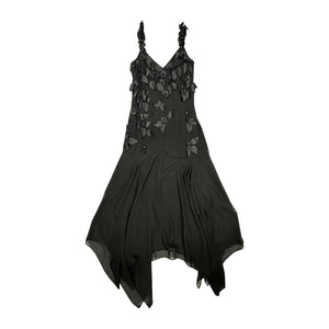 Get ready to turn heads in this sleek R&M Richards formal dress, adorned with intricate black leaf designs. The measurements speak for themselves: 34" flat chest, 28" waist, 35" hips, and a stunning 55" length.