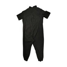 Load image into Gallery viewer, Expertly designed for style and functionality, this Divided jumpsuit is available in a sleek black color and features convenient cargo chest pockets, pant pockets, and belt loops. The precise measurements of this jumpsuit are as follows: Chest - 52&quot;, S...