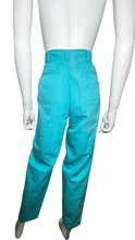 Load image into Gallery viewer, The Vintage Liz Wear Teal Pant is a rare and delightful find, boasting a vibrant color and a playful 3-button design. With a zipper closure, this pant is both fun and functional. It measures a flat waist of 24 inches, with hips of 42 inches, and an inseam of 30 inches. Plus, with a length of 41 inches, you&#39;ll want to strut your stuff in these stylish and unique pants.  &nbsp;