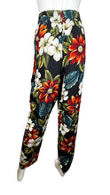 Load image into Gallery viewer, The Vintage Léger Floral Pant features a bold floral print, making a statement with its 100% Rayon fabric. With a high waisted fit, it measures 26&quot; around the waist and has a comfortable 28&quot; inseam. Its chic harem style and length of 41&quot; make it a unique addition to any wardrobe.