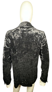 This vintage Harve Benard by Senard Holtzman Button Up features a sleek black crushed velvet material, creating a cozy cardigan style with a touch of glamour. Measured flat, its chest is a perfect 38 inches and its sleeves extend to 23 inches, while it...