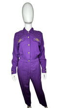 Load image into Gallery viewer, This rare find Vintage 80&#39;s Saint Germain Jumpsuit is a vintage purple button up jumpsuit with gold stitching and embellishing with a stretch waist. Measured Flat Sleeve - 24&quot; Waist - 26&quot; Hips - 36&quot; Length - 58&quot;