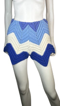 Load image into Gallery viewer, Vintage Urban Renewal VTG Knitted Shorts are multi-blue and white colored knitted vintage shorts wit stretchy waist band. Measured Flat Waist - 21&quot; Hips - 34&quot; Length - 11&quot;