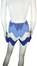 Load image into Gallery viewer, Vintage Urban Renewal VTG Knitted Shorts are multi-blue and white colored knitted vintage shorts wit stretchy waist band. Measured Flat Waist - 21&quot; Hips - 34&quot; Length - 11&quot;