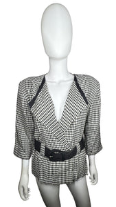 Vintage Perceptions Blazer is a blazer with black belt and houndstooth all over print. Measured Flat Chest - 30" Sleeve - 17" Length - 24 1/2"