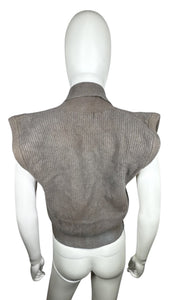 The Vintage JH Collectibles Cardigan Vest is a olive green lambs wool and rabbit hair cardigan vest.