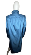 Load image into Gallery viewer, This Vintage Objectives jacket in blue nylon offers a unique trench style with a double layered design and removable inner layer. With measurements of 36&quot; in the chest, 22 1/2&quot; in the sleeves, and a length of 45&quot;, it&#39;s a practical and stylish addition...